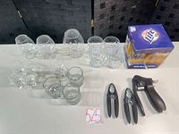 Overview of all glassware, corkscrews and boxed Miller Lite glasses