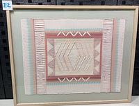 Full view of framed artwork