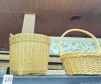 Both wicker baskets together for overall view and relative size