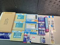 Wide view showing all boxed kits, adhesives, tool and sheet packs