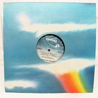 Front of die-cut sleeve showing cloud and rainbow artwork with record inside