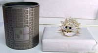 Figurine with original cylindrical box