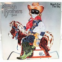 Front cover of The Allman Brothers Band Reach For The Sky LP showing artwork and overall sleeve condition