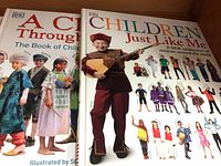 Front covers of “A Child Through Time” and “Children Just Like Me: A New Celebration of Children Around the World.”