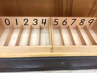 joined twin trays numbered 0-9 showing dividers
