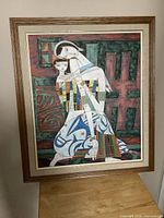 Front view of framed serigraph showing full artwork and frame