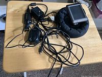 All components: GPS unit, dash pad mount, power adapters, USB cable