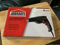 Front of boxed Jobmate 3.5A hand drill showing model and image