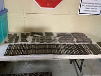 Full lot laid out on table: straight, curved, turnout and crossover track visible