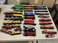 All 39 train pieces laid out on table