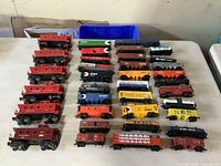 All 36 train cars arranged in four columns