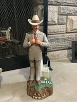 Front view of J.R. Ewing ceramic musical whiskey decanter