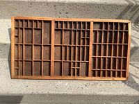 Full view of Hamilton wooden printers tray on steps