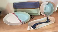 Group shot of all four pottery pieces