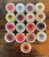 All seventeen Scentsy wax melt sample pods laid out showing labels
