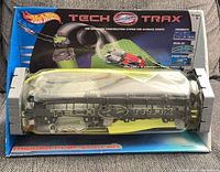 Front of sealed Hot Wheels Tech Trax set showing clear stunt tube and packaging