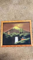 Front view of framed silk painting showing full artwork and frame