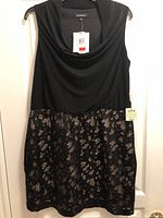 Front view of full dress on hanger