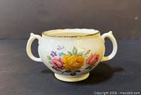 Front view of Ridgway Chateau Rose sugar bowl showing floral design and double handles