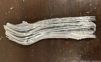 Bundle of stainless steel mini forks wrapped in plastic