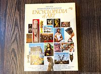 Front cover showing title and collage of art images