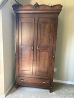 Front view closed showing doors and drawer