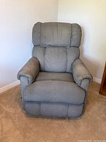 Front view of gray fabric recliner chair