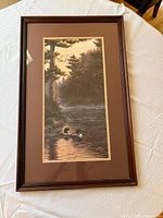 Full view of framed print on table
