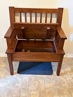 Bench with seat open, showing storage compartment and hinges