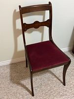 Front angled view of chair showing frame and seat