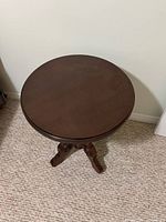 Round dark brown table top surface