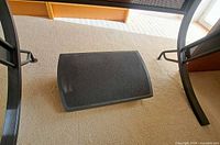 Top view of black 3M foot rest under desk