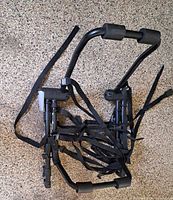 Overall view of folded SportRack bike rack with straps