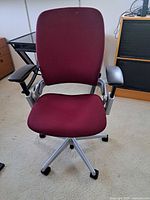 Front view of Steelcase Leap V2 chair showing upholstery, frame and base