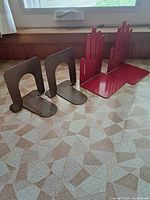 All four bookends, two designs shown upright on countertop