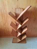 Full view of wooden zigzag bookshelf