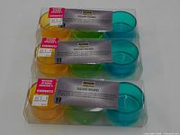 Front view of all three sealed packs showing coloured glass holders and Light House branding