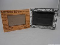 Front view of both picture frames showing designs and openings