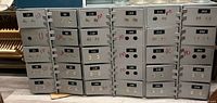 front view of grouped numbered safe deposit drawers