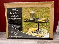 Front of boxed Texsport swivel grill showing product image and specifications