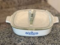 Top view of casserole with lid showing overall shape and lid handle