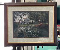 Full view of framed print on easel