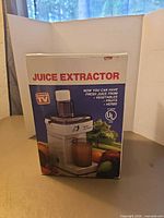 Front of boxed Healthy Choices juice extractor