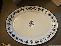 Top view of blue and white enamel oval platter