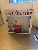 Retail box showing image of punch bowl set
