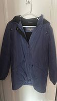 Front view of blue Liz Claiborne hooded jacket showing zipper, snaps and pockets