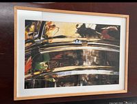 Full view of framed print showing artwork, frame, and mat