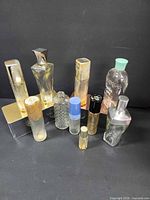 Group shot of all ten fragrance bottles