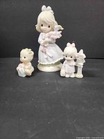All three Precious Moments pieces grouped