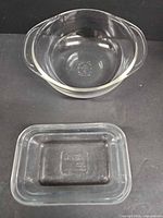 Round clear Pyrex casserole and rectangular glass loaf pan